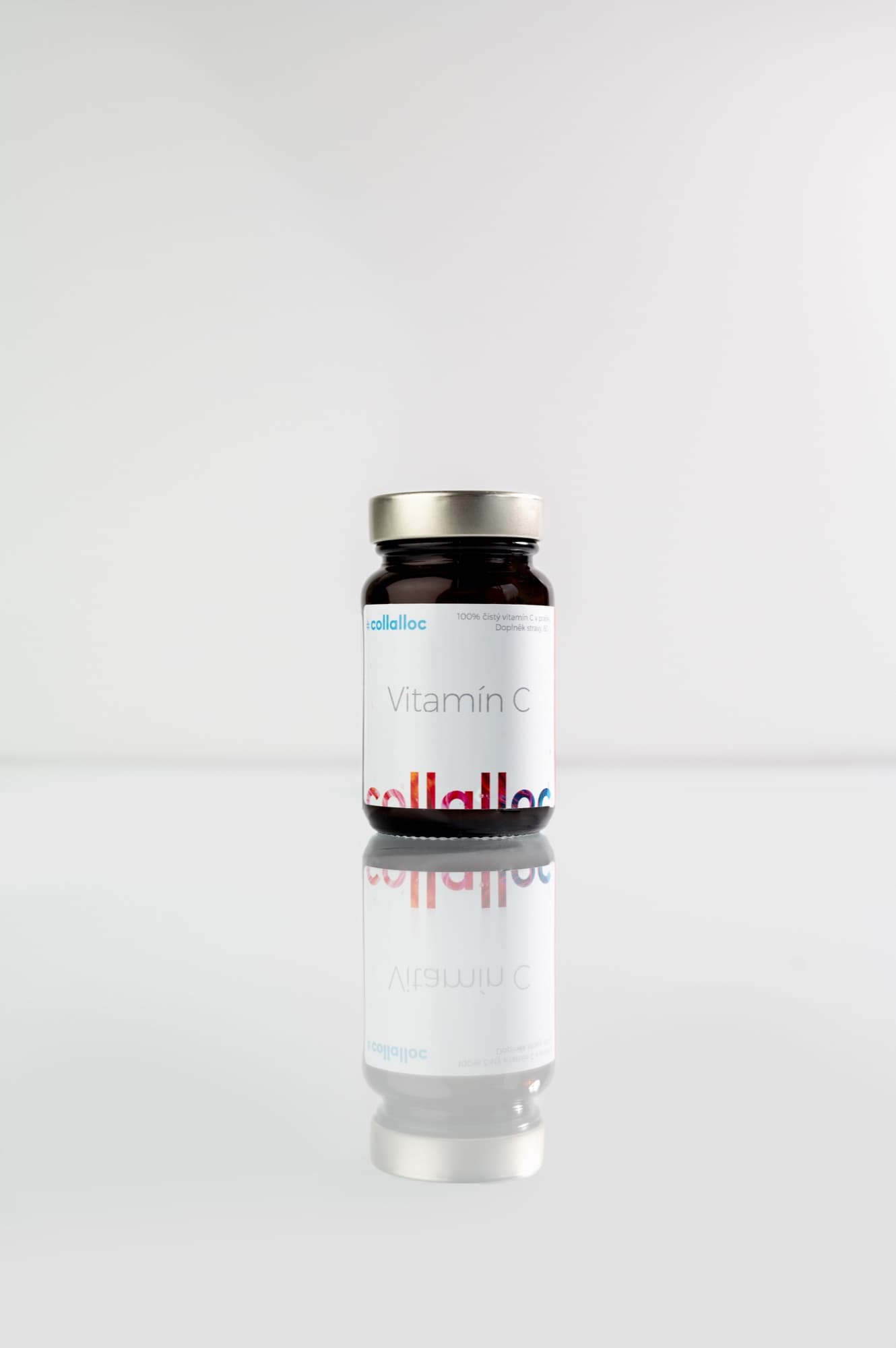 Glass jar of collalloc Vitamin C, full view